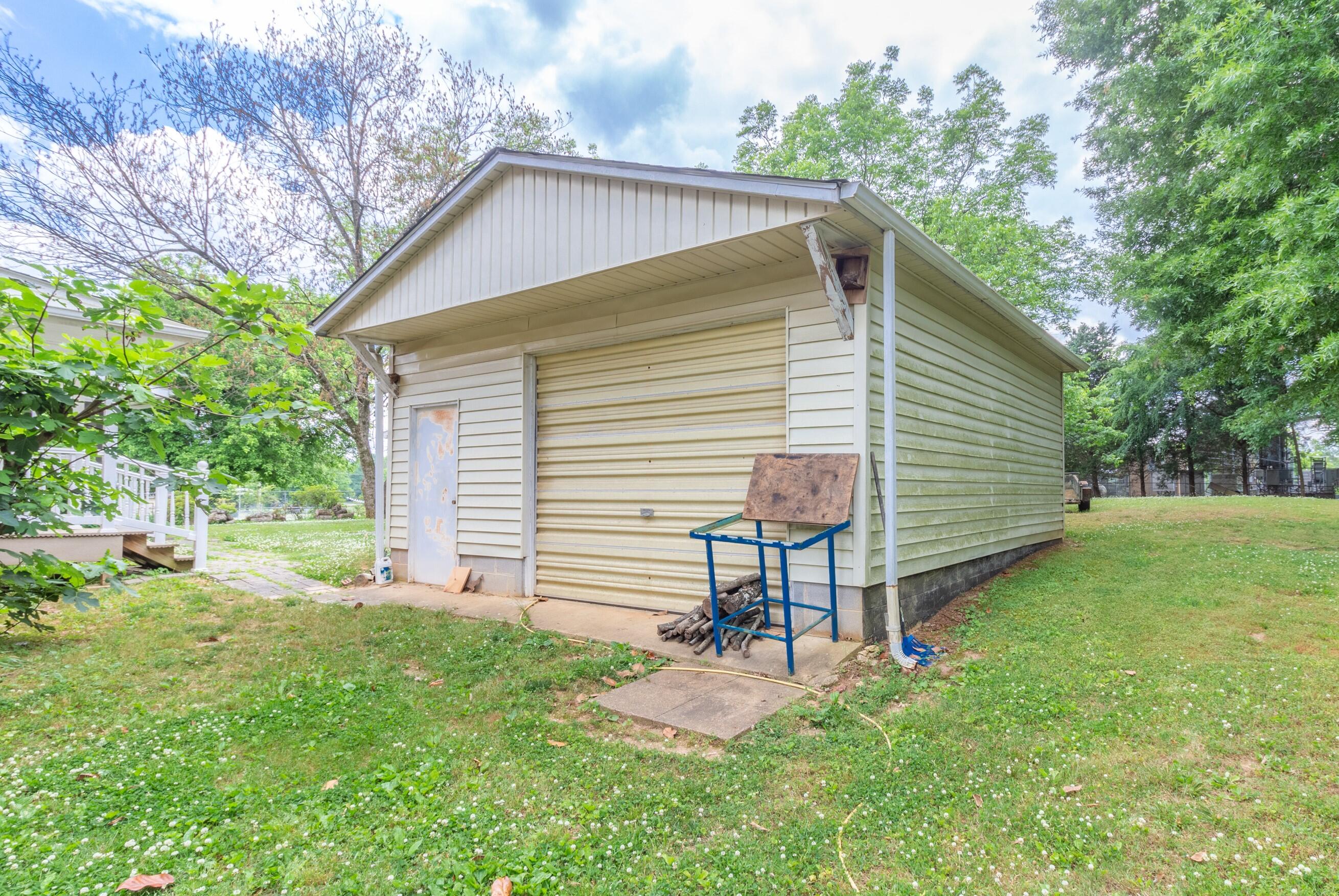 1712 Longview Street Hixson, TN 37343 - Photo 31 of 31 Garage with Pecan Trees in rear
