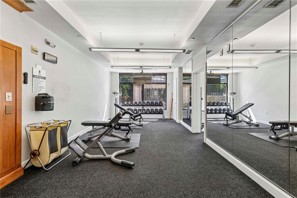 3445 Stratford Road Northeast, Unit 3105 Atlanta, GA 30326 - Photo 39 of 47 a view of a room with gym equipment