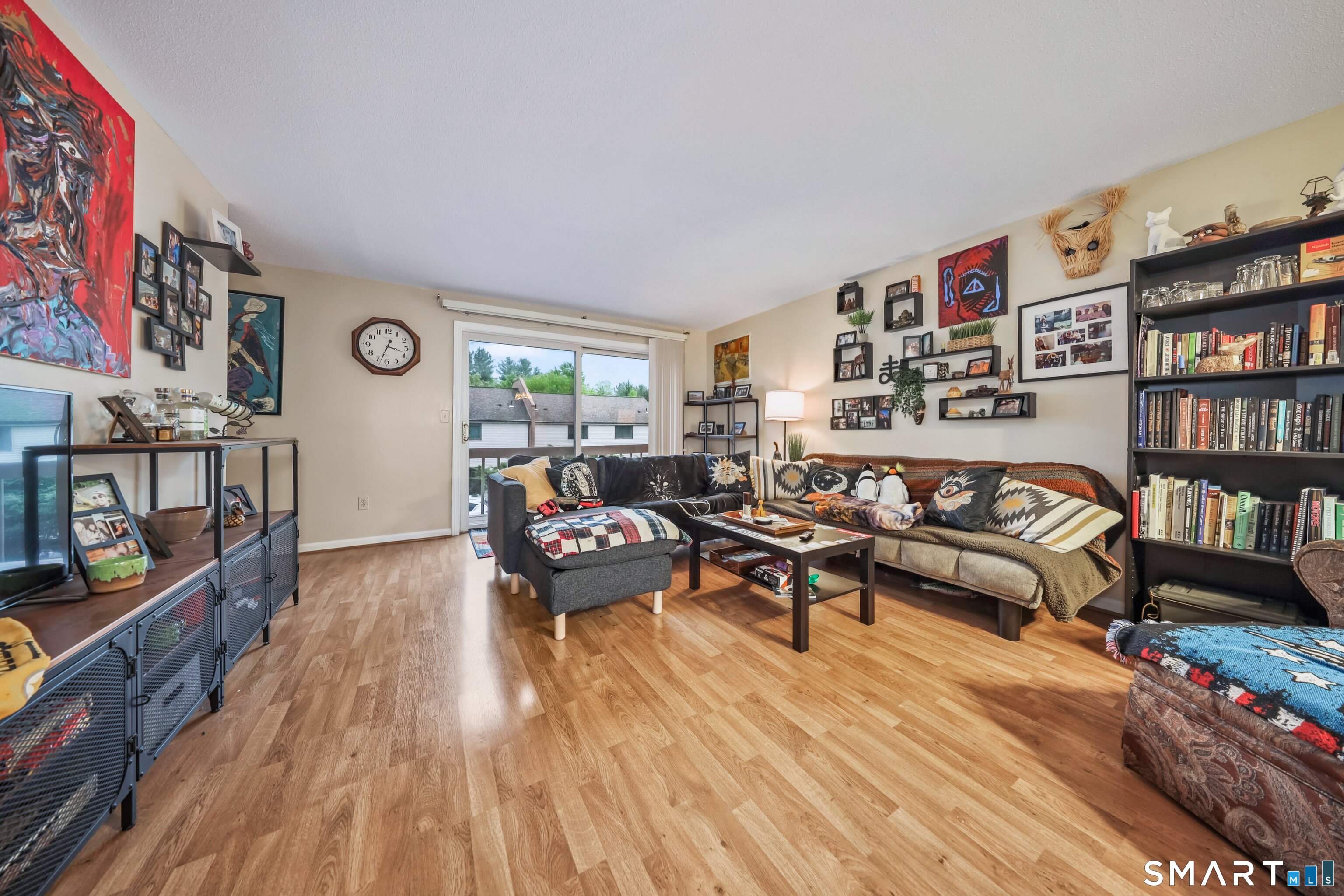 349 Allen Road, Unit 34C Torrington, CT 06790 - Photo 4 of 31 a living room with furniture and a wooden floor