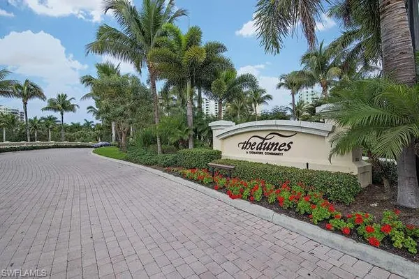 a sign on the side of the road