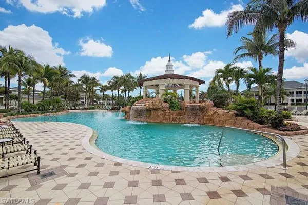 a view of a swimming pool with a garden