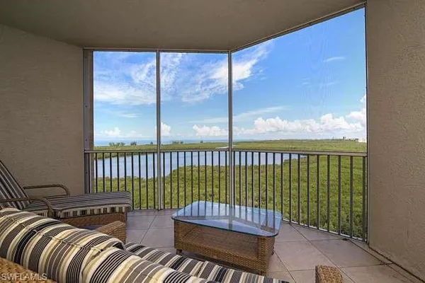 a view of a two chairs in the room