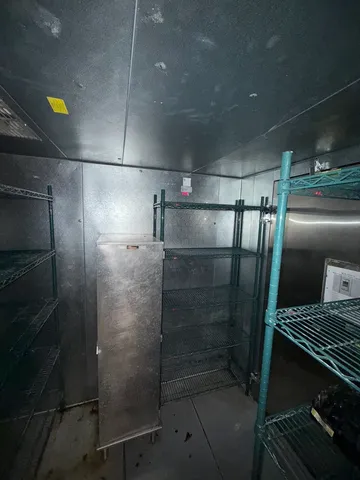 a bathroom with a shower and a stove