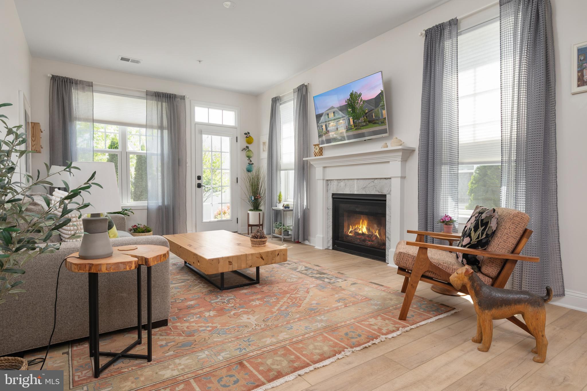 2858 Dragon Fly Way Odenton, MD 21113 - Photo 11 of 38 Warm, inviting living room with gas fireplace