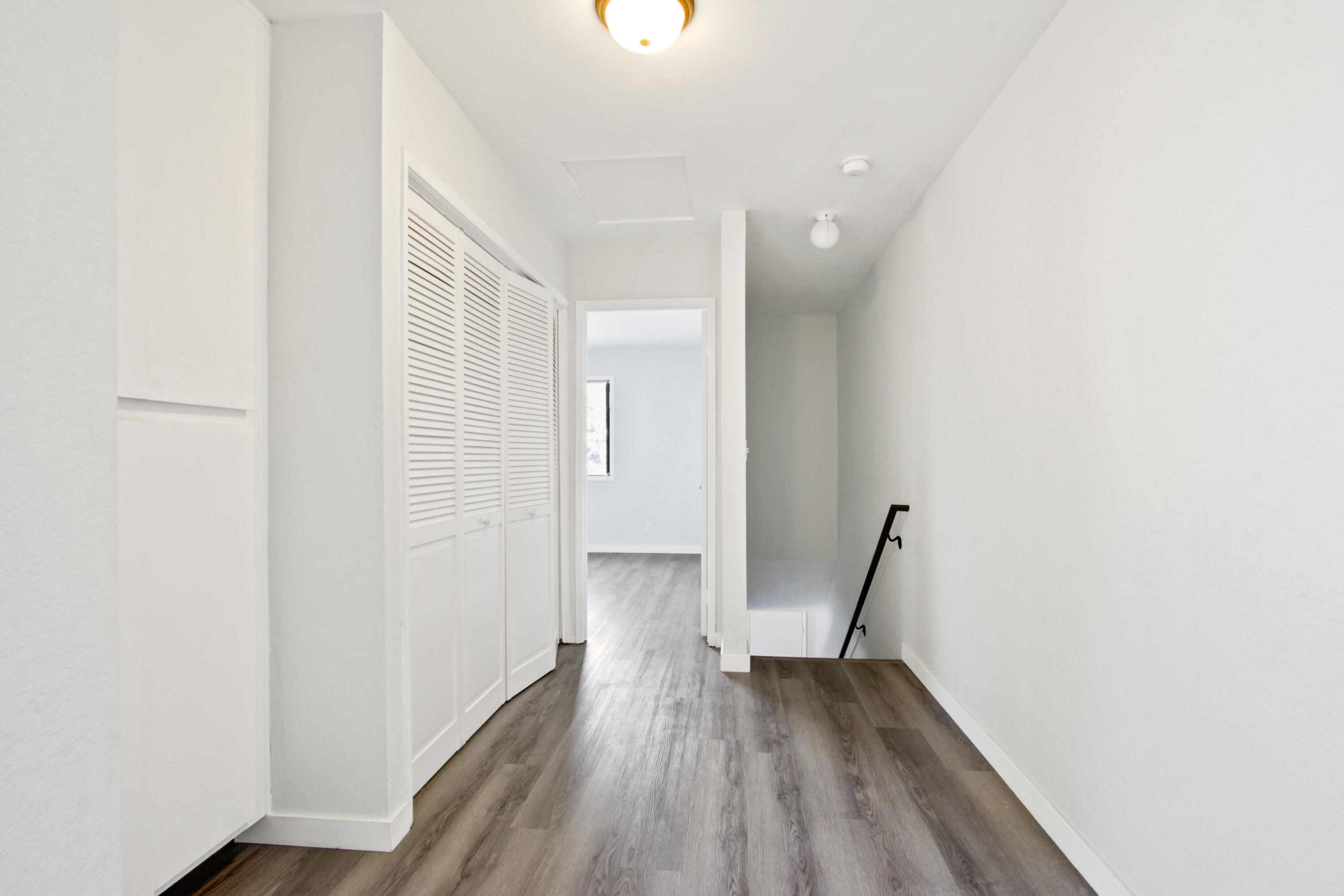 9542 Ball Road, Unit 1 Anaheim, CA 92804 - Photo 11 of 24 a view of hallway with wooden floor