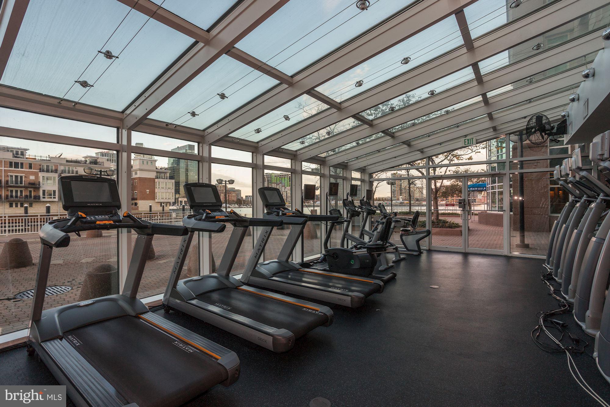 100 Harborview Drive, Unit 1708 Baltimore, MD 21230 - Photo 28 of 39 Workout Room with Ellipticals and Treadmills