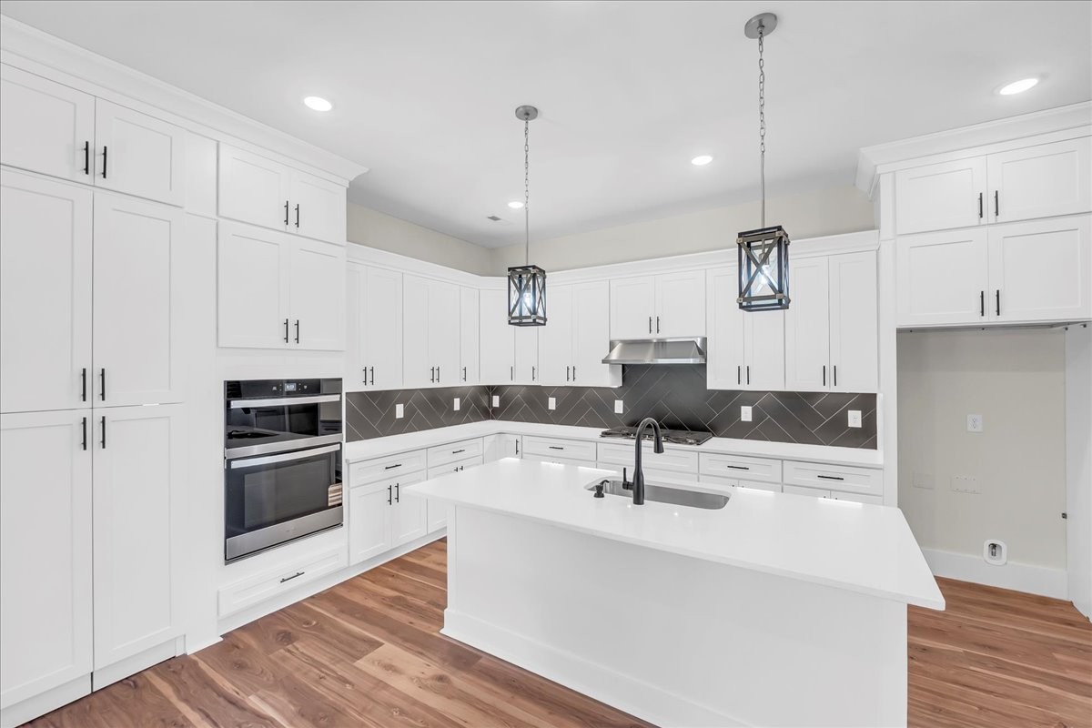 309 Hickory Grove Drive Morrison, TN 37357 - Photo 17 of 50 a kitchen with kitchen island a sink stainless steel appliances and cabinets