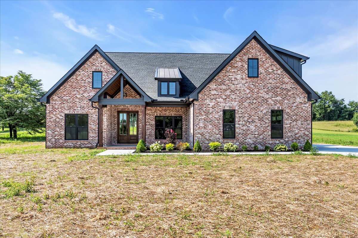 309 Hickory Grove Drive Morrison, TN 37357 - Photo 2 of 50 a front view of a house with a yard