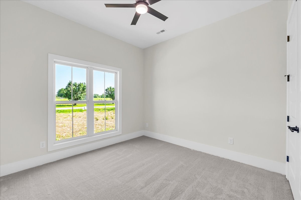 309 Hickory Grove Drive Morrison, TN 37357 - Photo 42 of 50 wooden floor in an empty room with a window