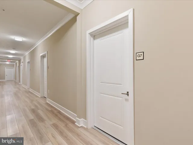 a view of a hallway with closet