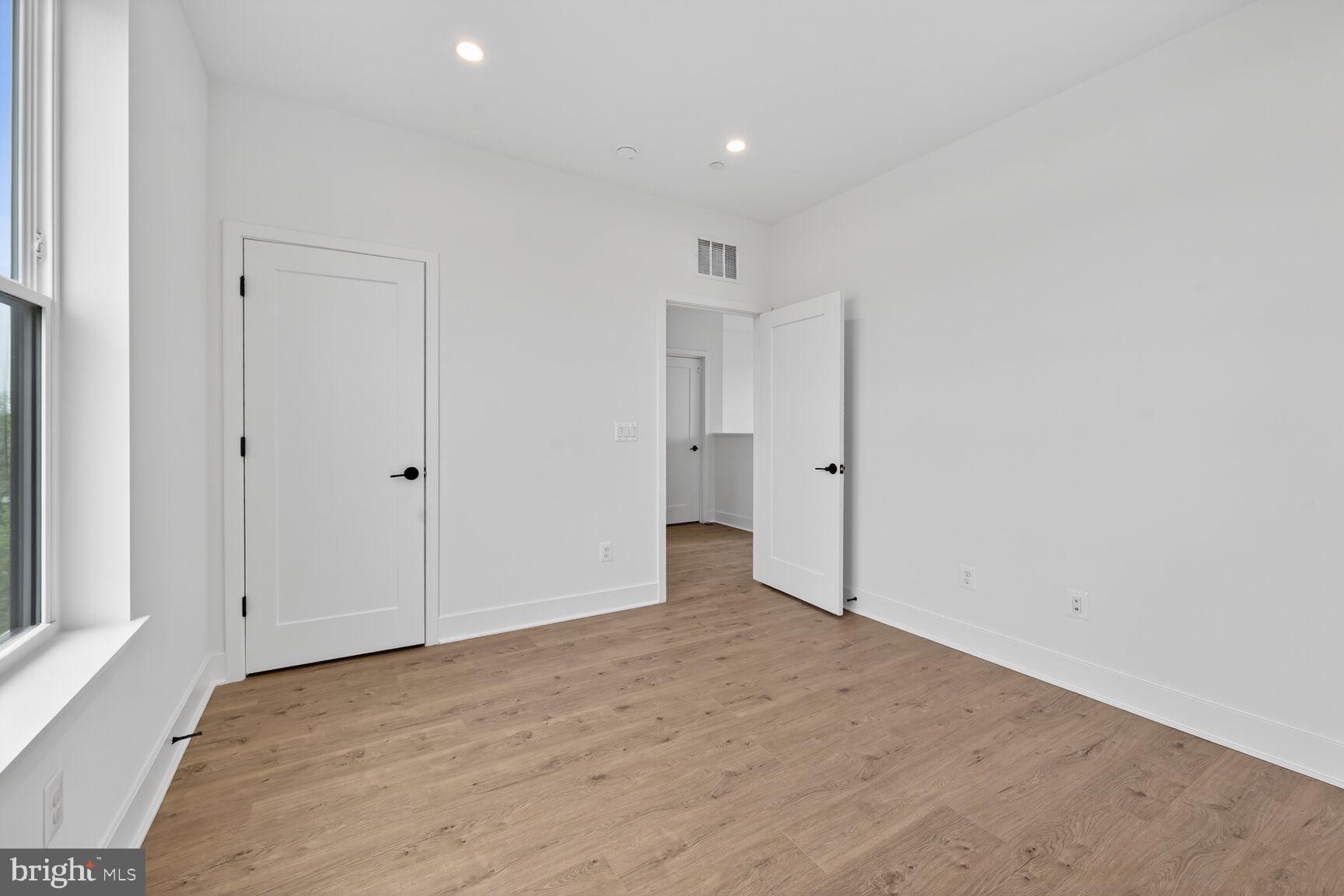 1135 Polaris Road, Unit NOTTINGHAM 101 Potomac, MD 20854 - Photo 25 of 26 a view of an empty room