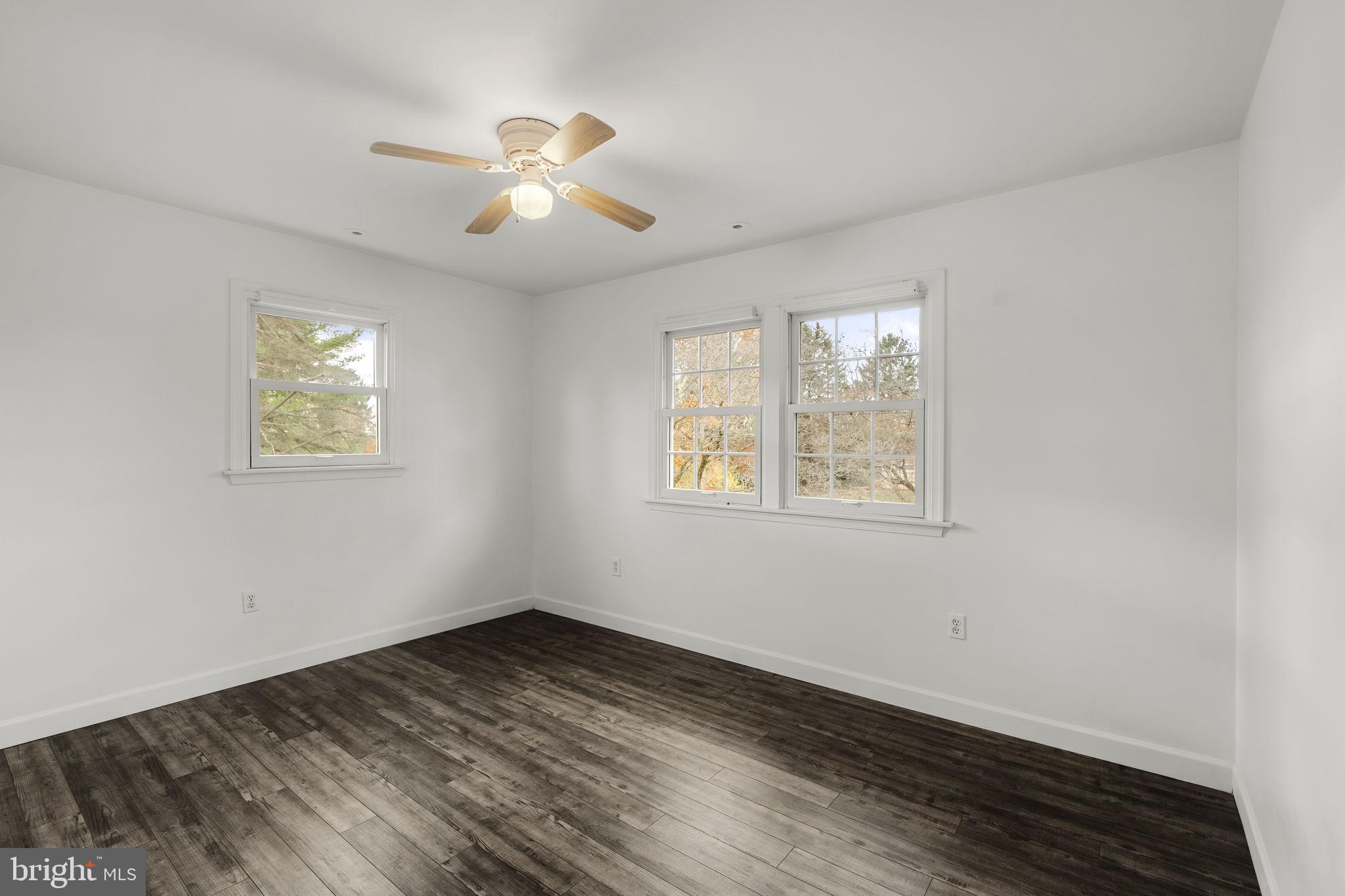 105 Hershey Road Lititz, PA 17543 - Photo 22 of 56 a view of empty room with wooden floor and fan