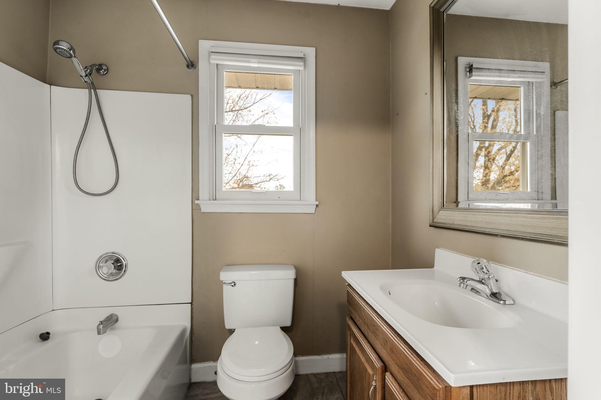 105 Hershey Road Lititz, PA 17543 - Photo 26 of 56 a bathroom with a sink toilet and shower