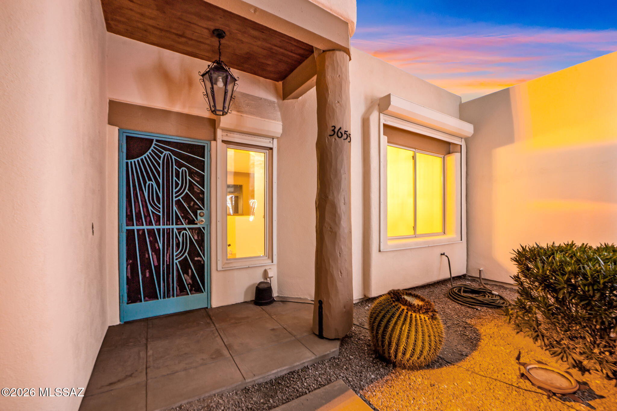 3655 North Harrison Road Tucson, AZ 85749 - Photo 8 of 51 a bedroom with a bed and a window