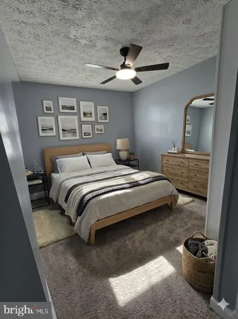 a bedroom with a bed and a cabinets
