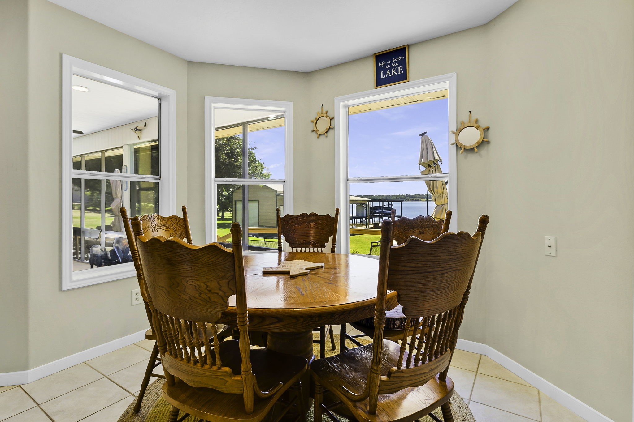 1346 Landing Way Trinity, TX 75862 - Photo 12 of 45 a dining room with furniture and window