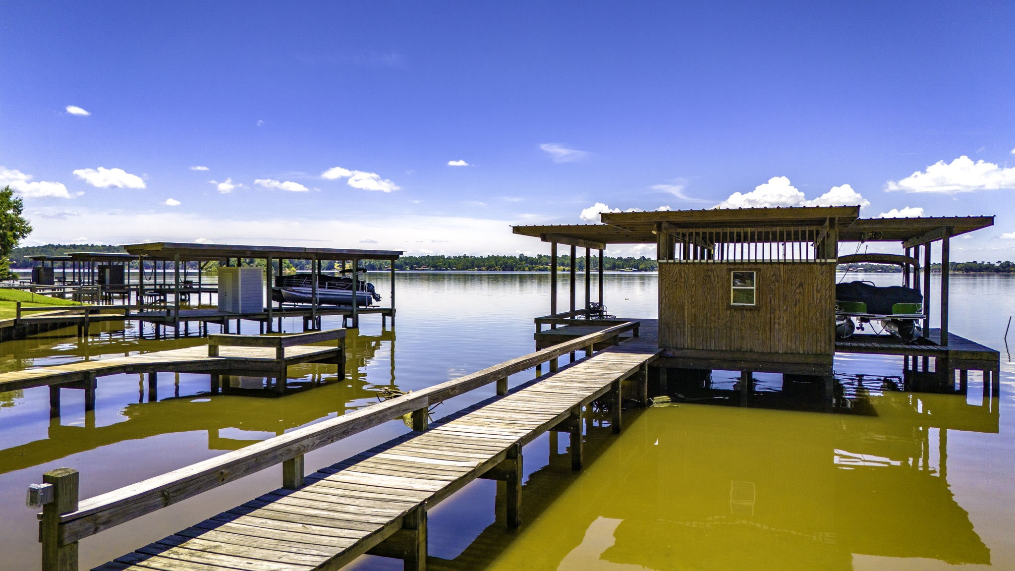 1346 Landing Way Trinity, TX 75862 - Photo 29 of 45 a view of a swimming pool with seating area
