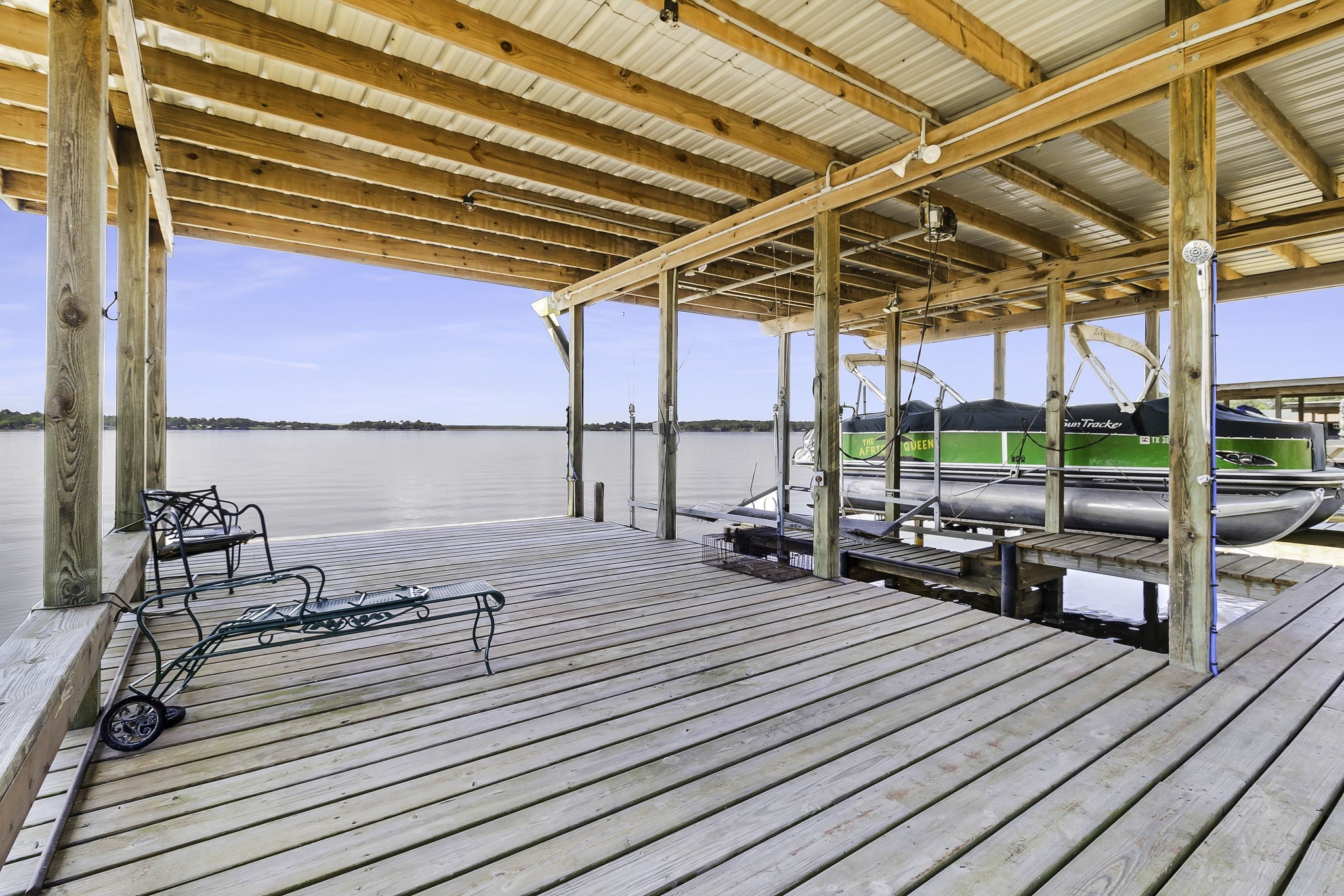 1346 Landing Way Trinity, TX 75862 - Photo 30 of 45 a view of a balcony with wooden floor