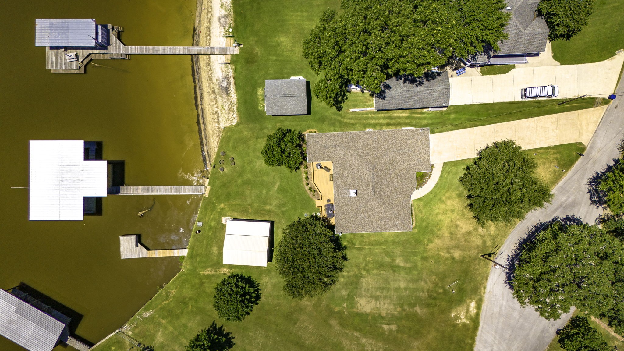 1346 Landing Way Trinity, TX 75862 - Photo 39 of 45 an aerial view of residential houses with swimming pool