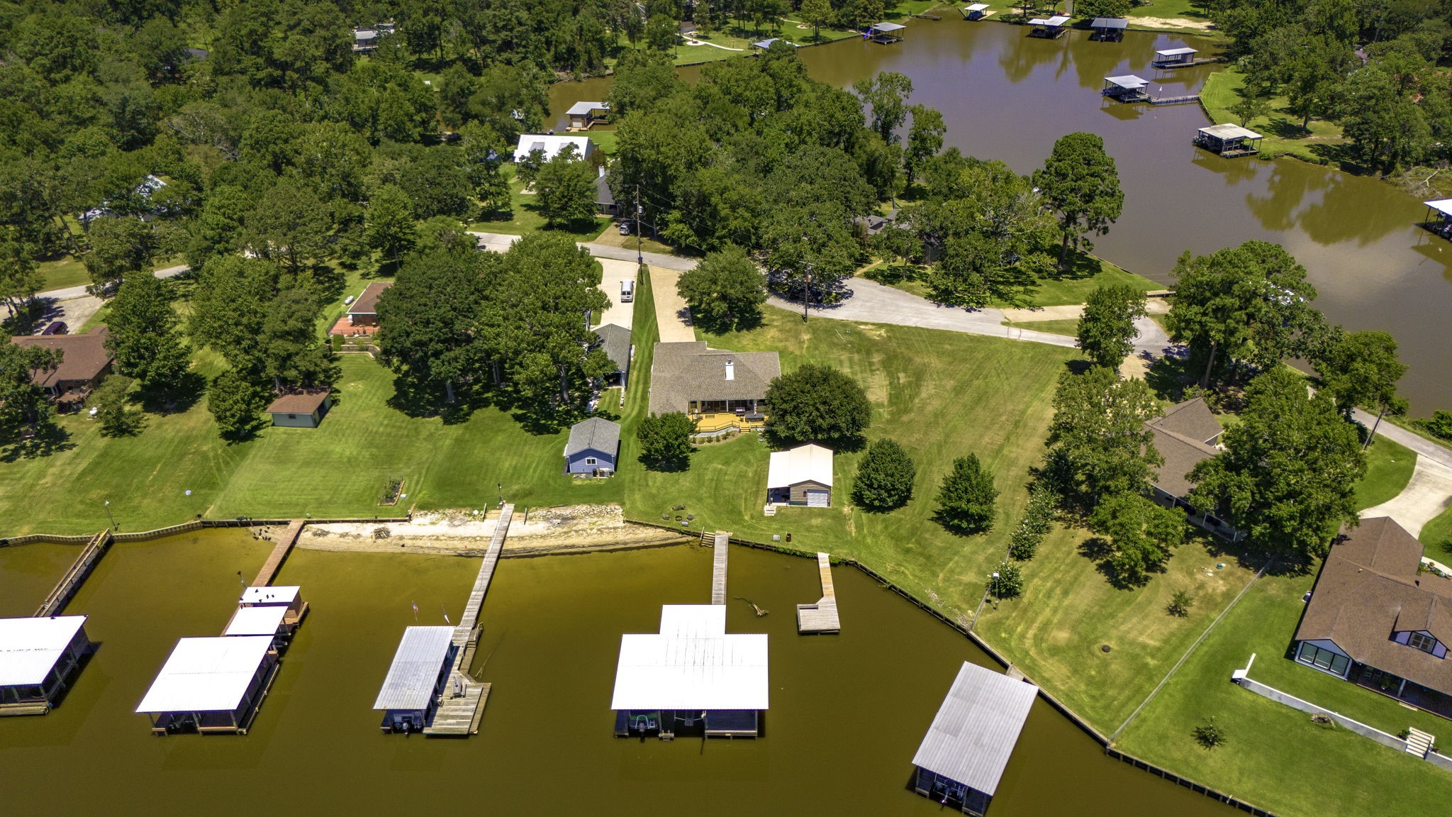 1346 Landing Way Trinity, TX 75862 - Photo 40 of 45 an aerial view of a house with a swimming pool
