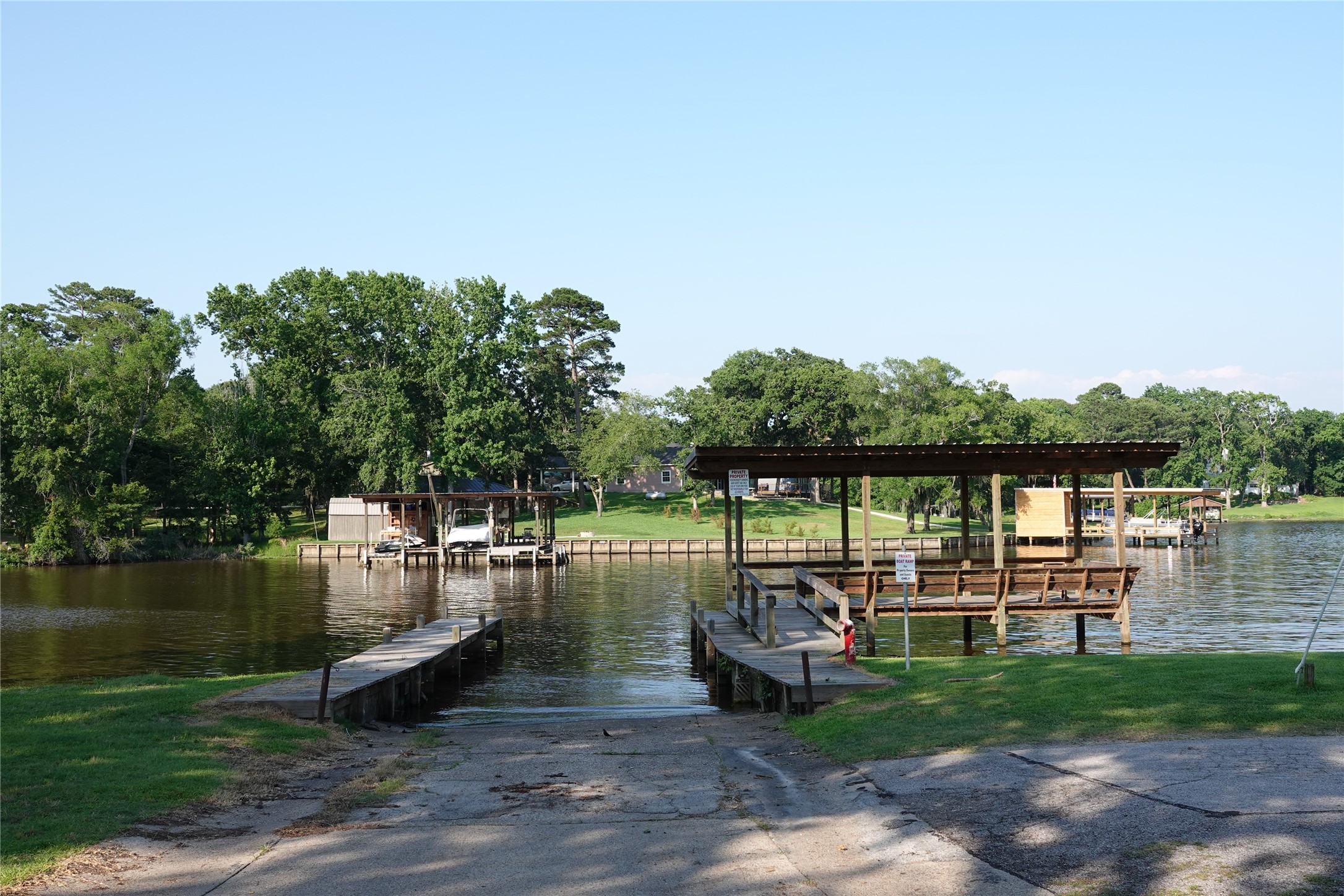 1346 Landing Way Trinity, TX 75862 - Photo 43 of 45 a view of a lake with houses in the back