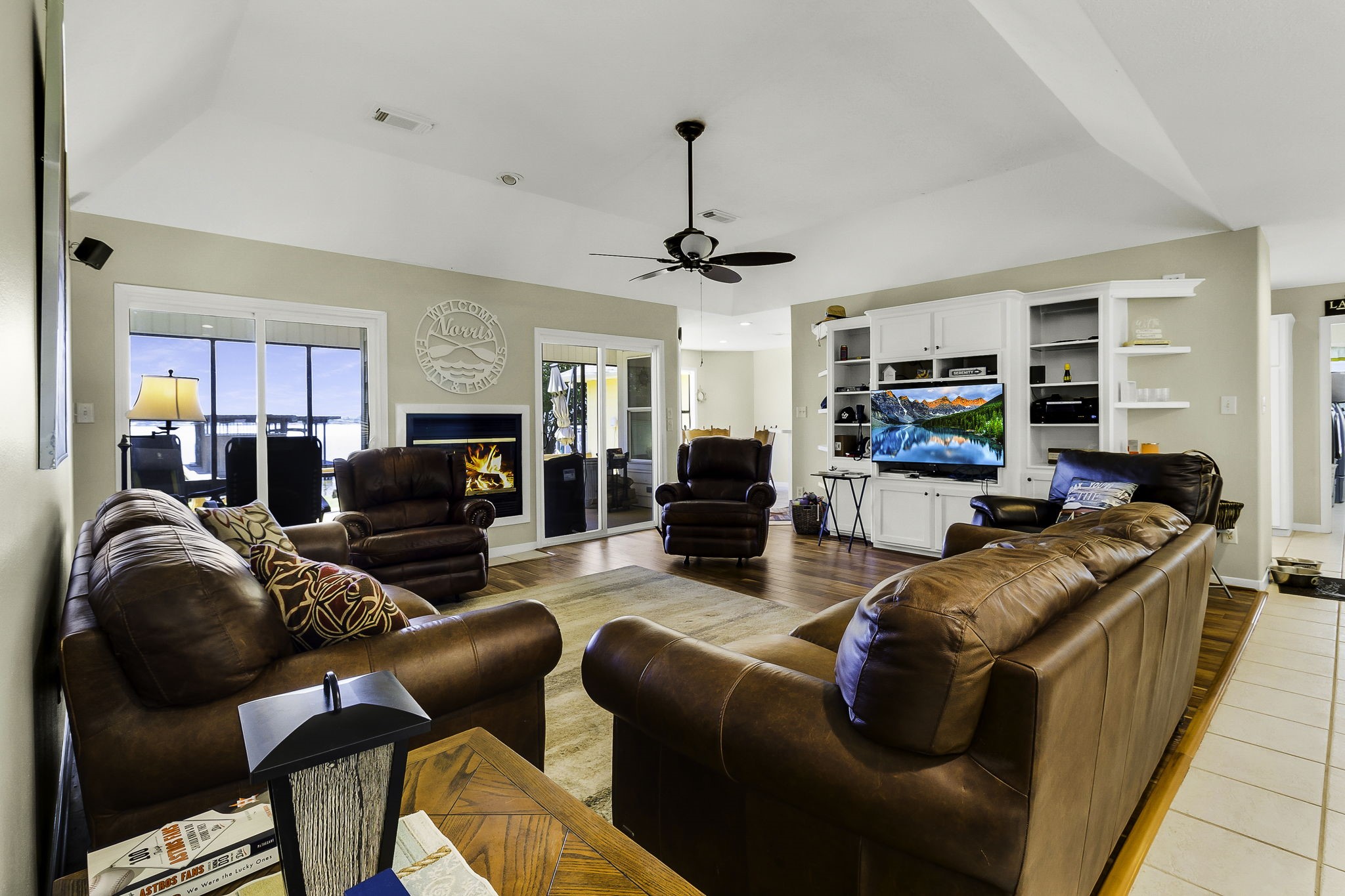 1346 Landing Way Trinity, TX 75862 - Photo 6 of 45 a living room with furniture a couch and a flat screen tv