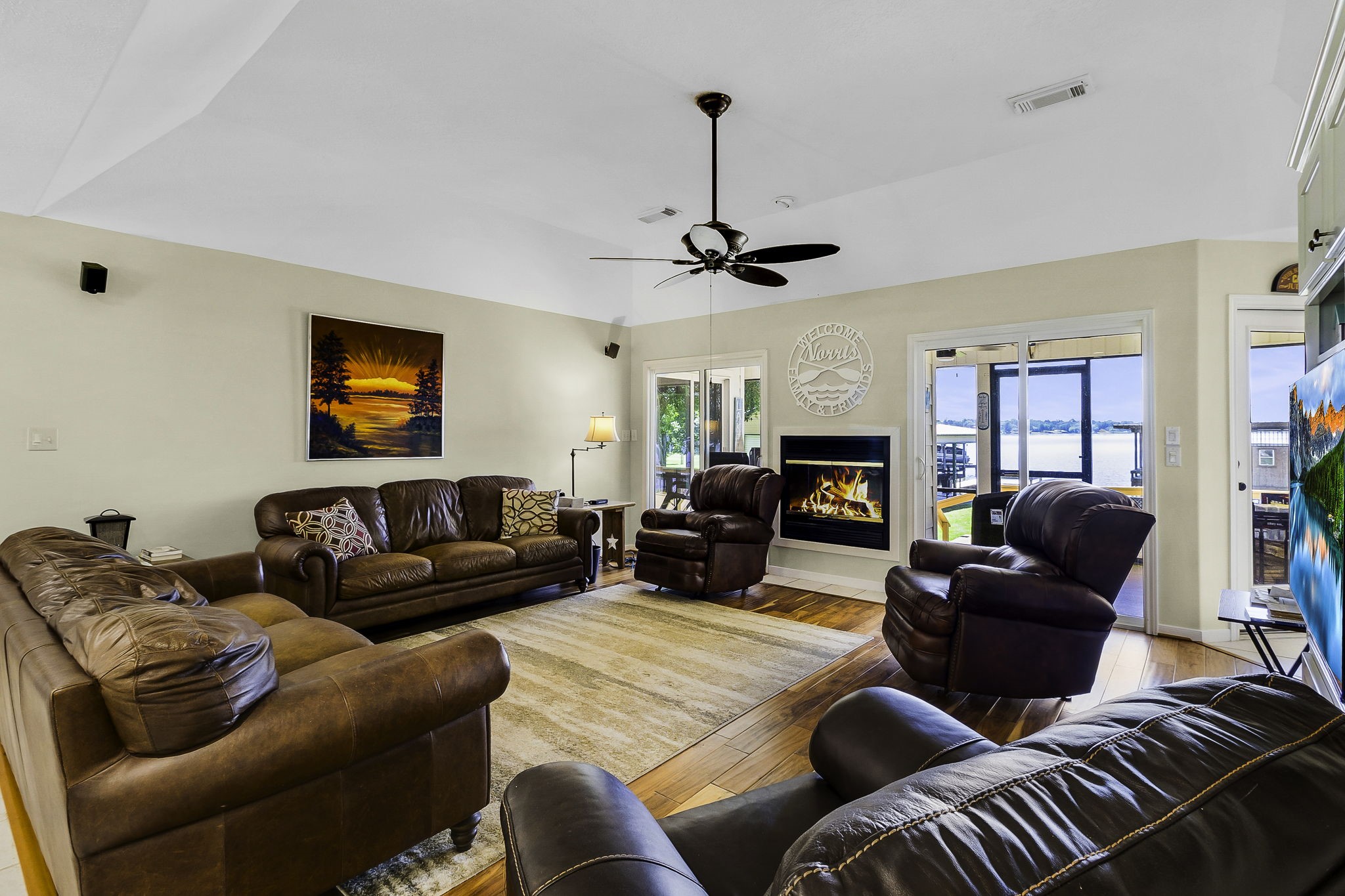 1346 Landing Way Trinity, TX 75862 - Photo 8 of 45 a living room with furniture ceiling fan and a fireplace