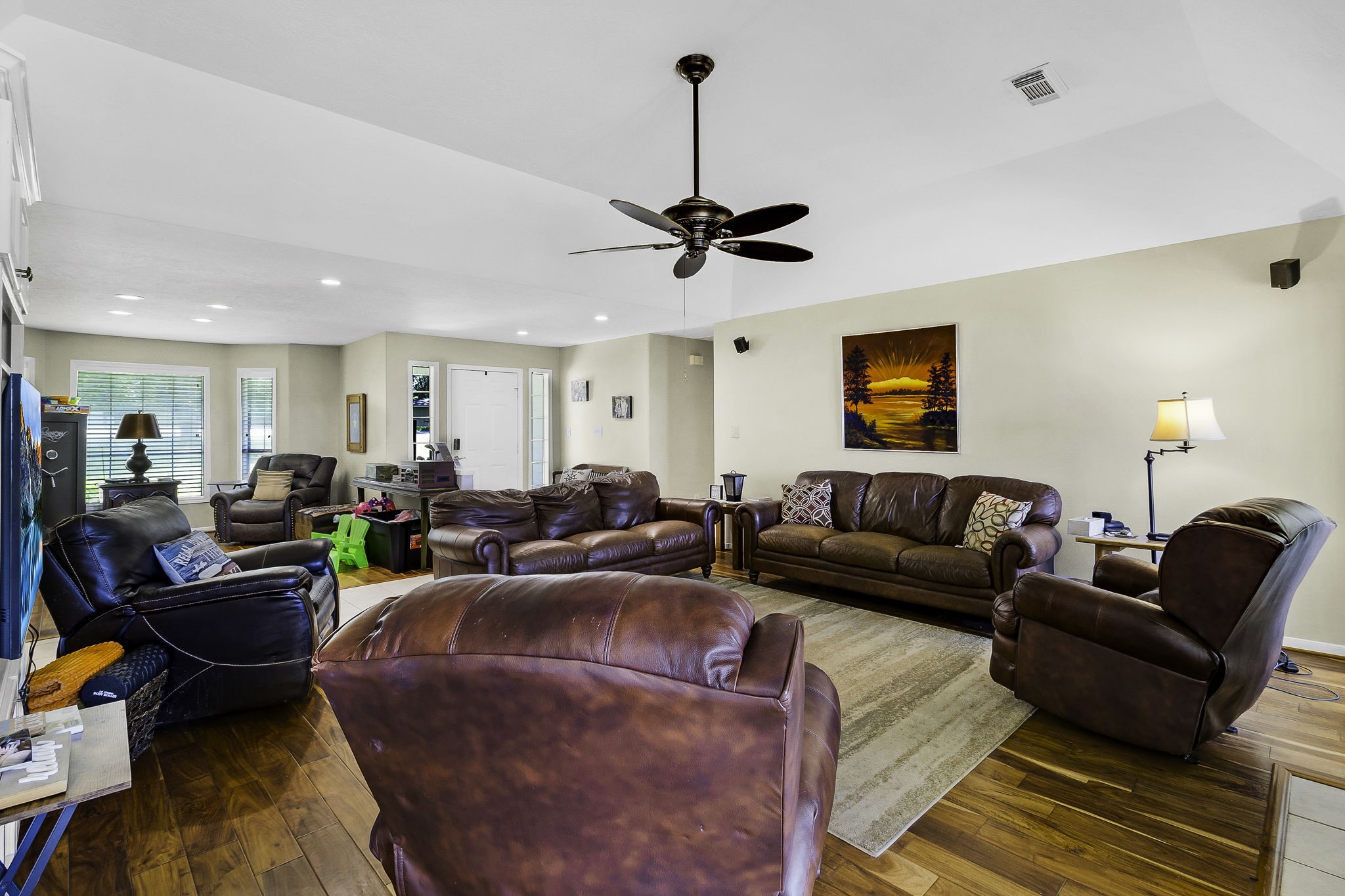 1346 Landing Way Trinity, TX 75862 - Photo 9 of 45 a living room with furniture a ceiling fan and a rug