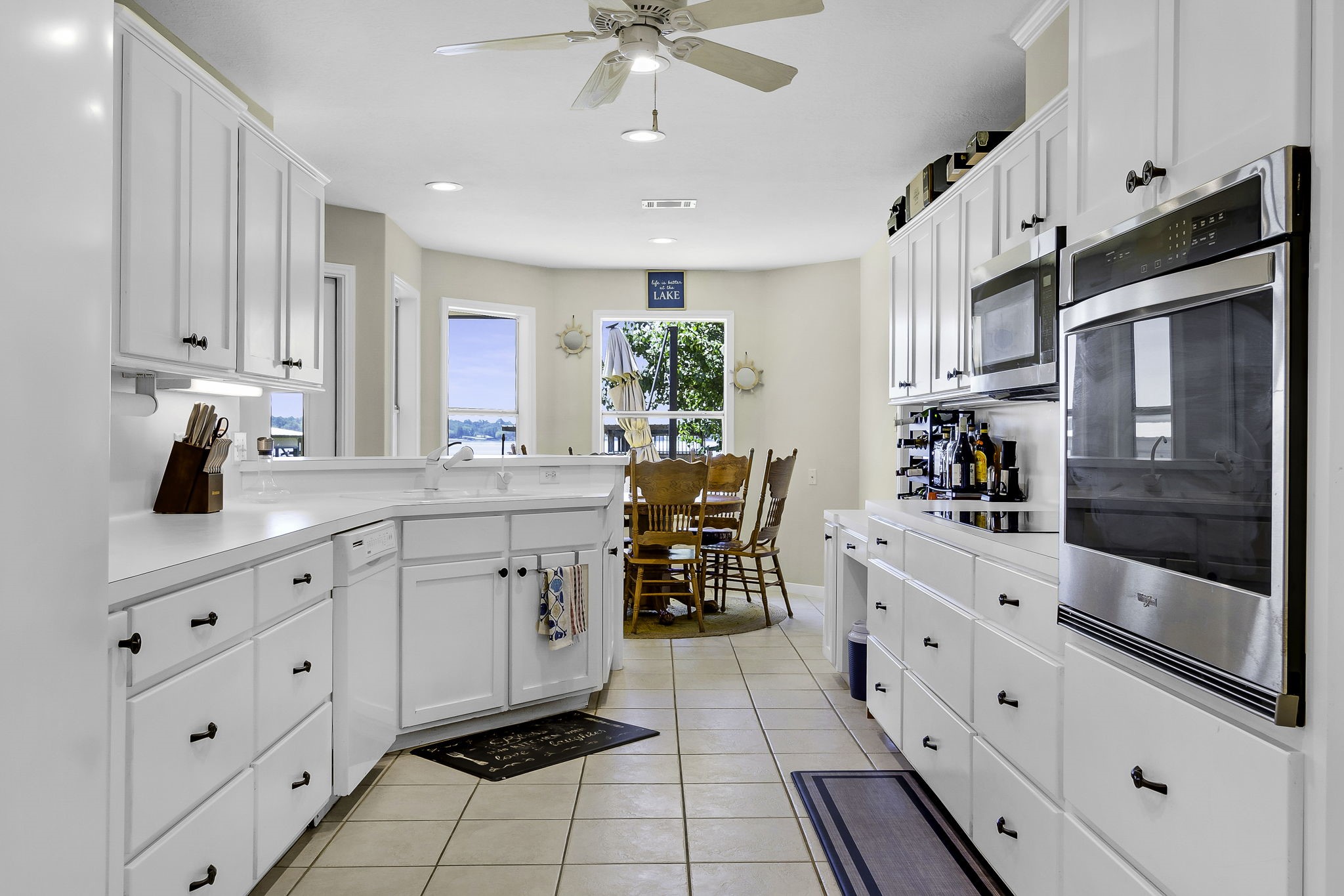 1346 Landing Way Trinity, TX 75862 - Photo 10 of 45 a kitchen with cabinets and window