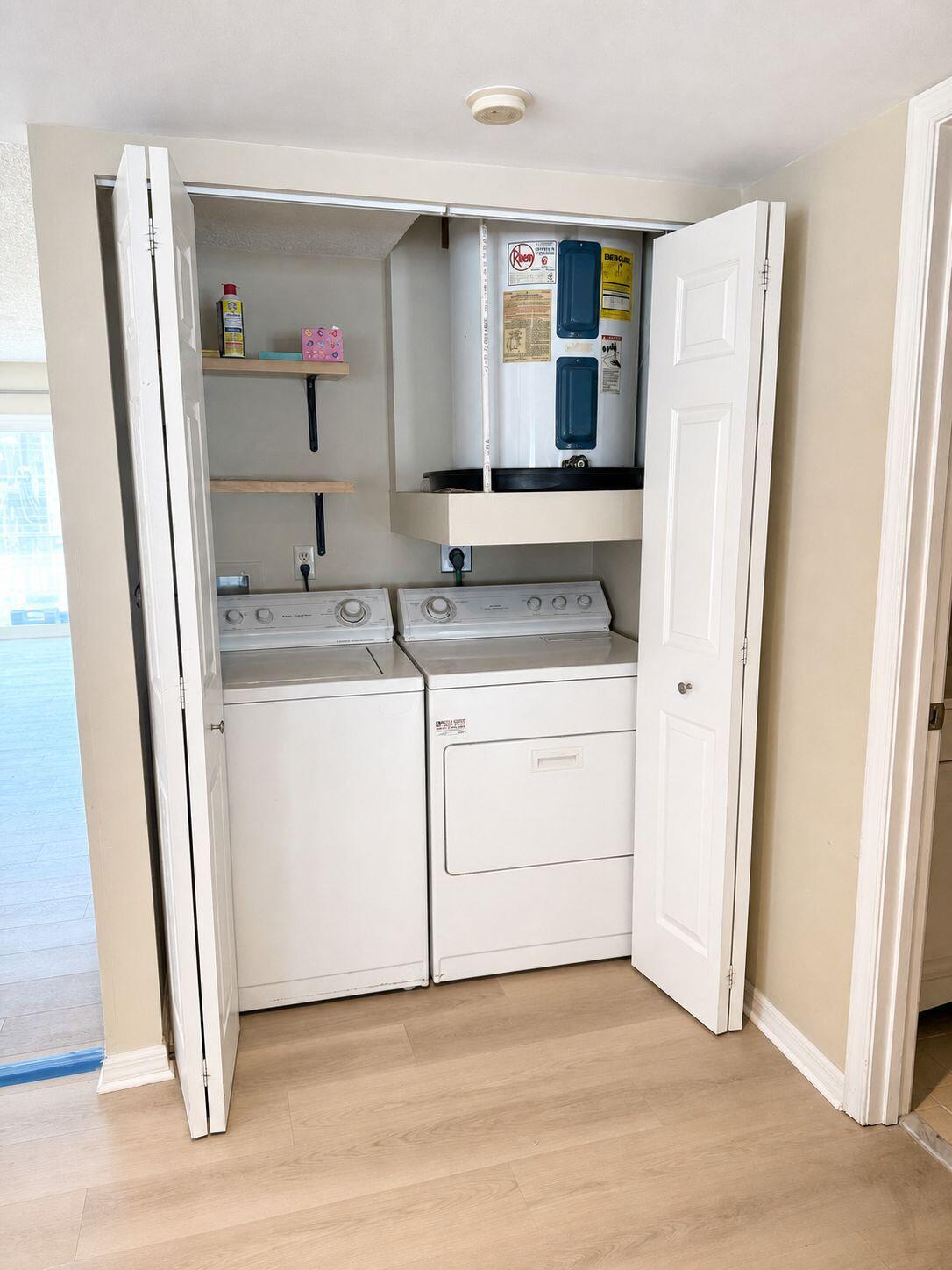 1871 Southwest Palm City Road, Unit G401 Stuart, FL 34994 - Photo 12 of 16 a view of kitchen with wooden floor