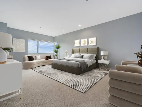 a bedroom with bed and a night stand