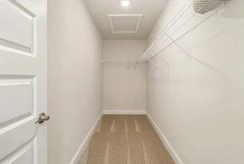 a view of a room with white walls