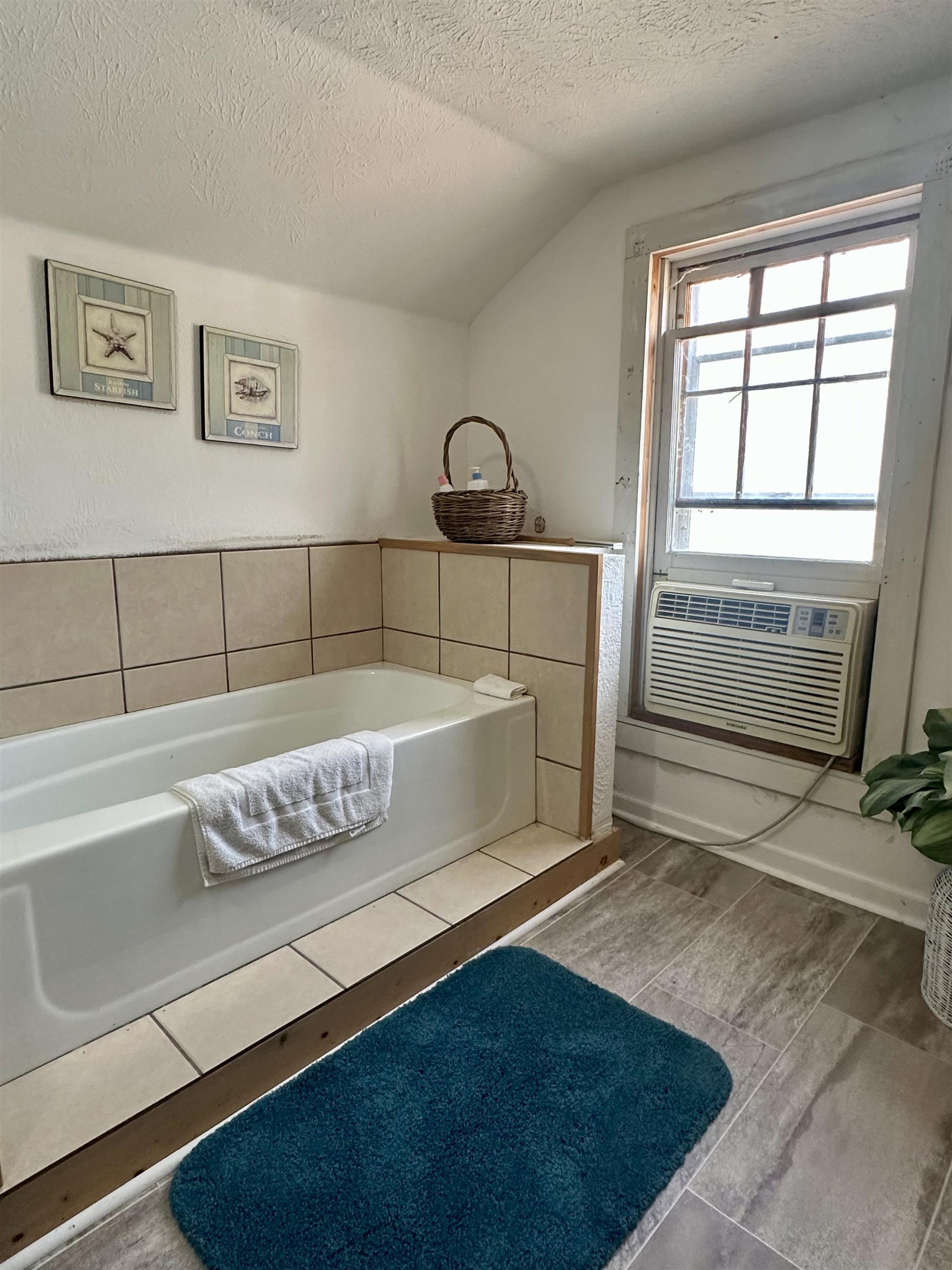 248 Canal Street Selmer, TN 38375 - Photo 16 of 21 a bedroom with a bed and a window