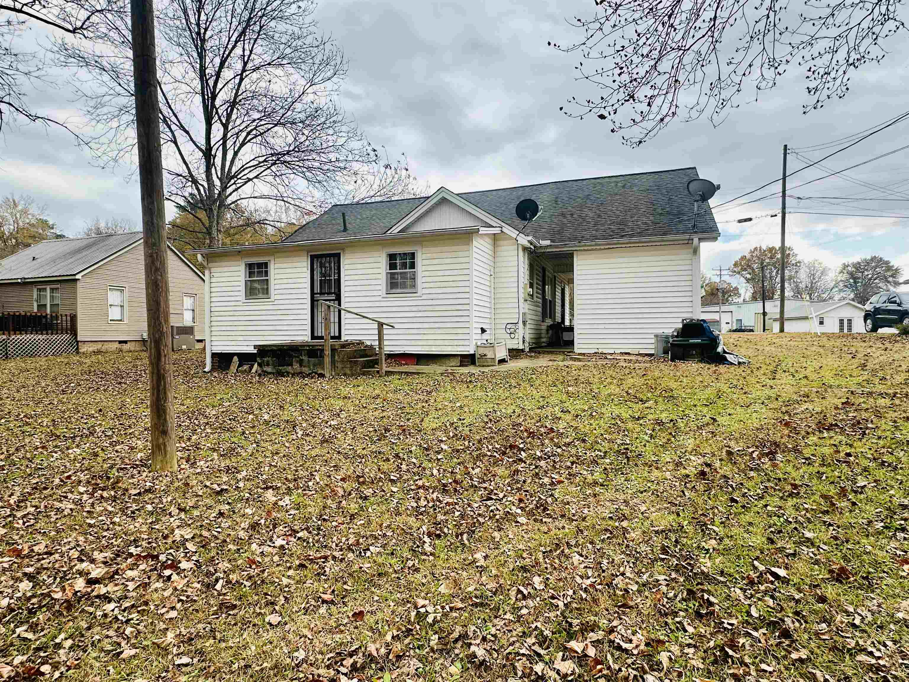 248 Canal Street Selmer, TN 38375 - Photo 18 of 21 a view of a house with a yard