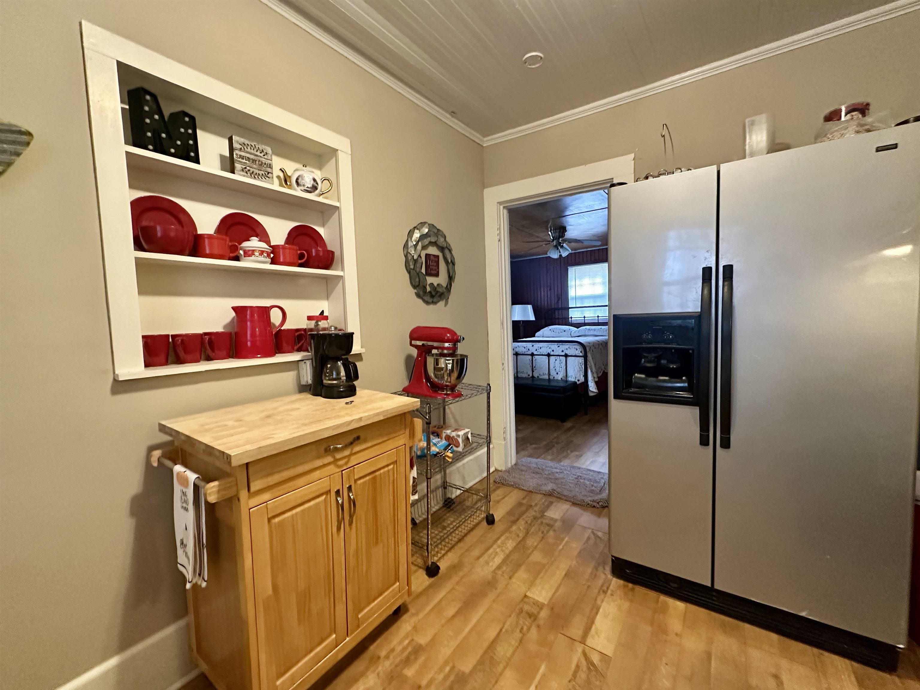 248 Canal Street Selmer, TN 38375 - Photo 6 of 21 a storage room with washer and dryer