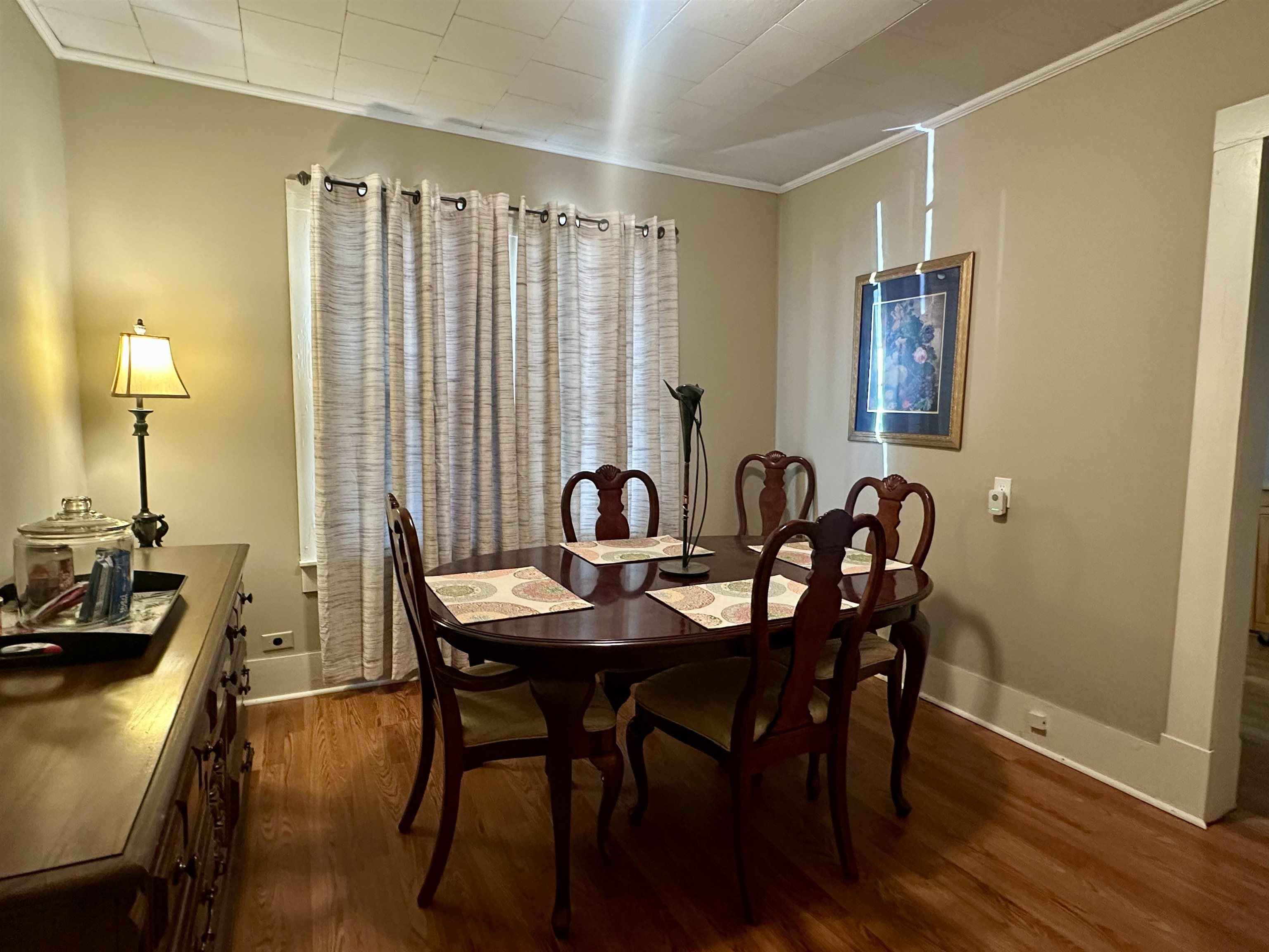 248 Canal Street Selmer, TN 38375 - Photo 8 of 21 a view of a a dining room with furniture window and wooden floor