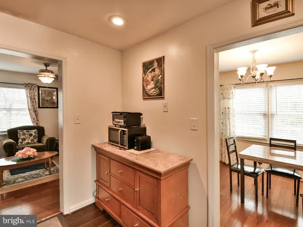 a kitchen with stainless steel appliances granite countertop a stove and a refrigerator