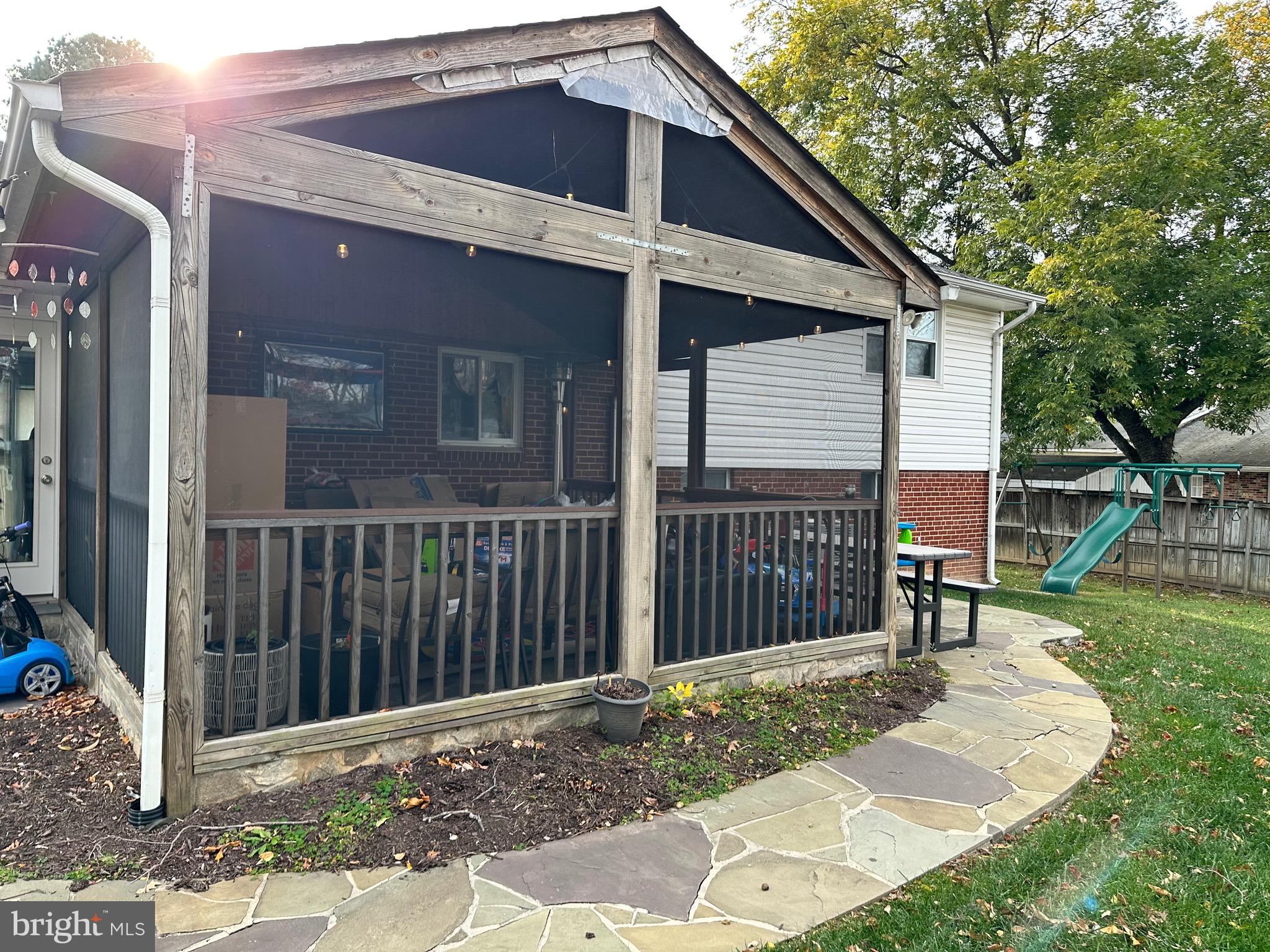 8140 Drayton Lane Springfield, VA 22151 - Photo 21 of 98 a front view of a house with a yard