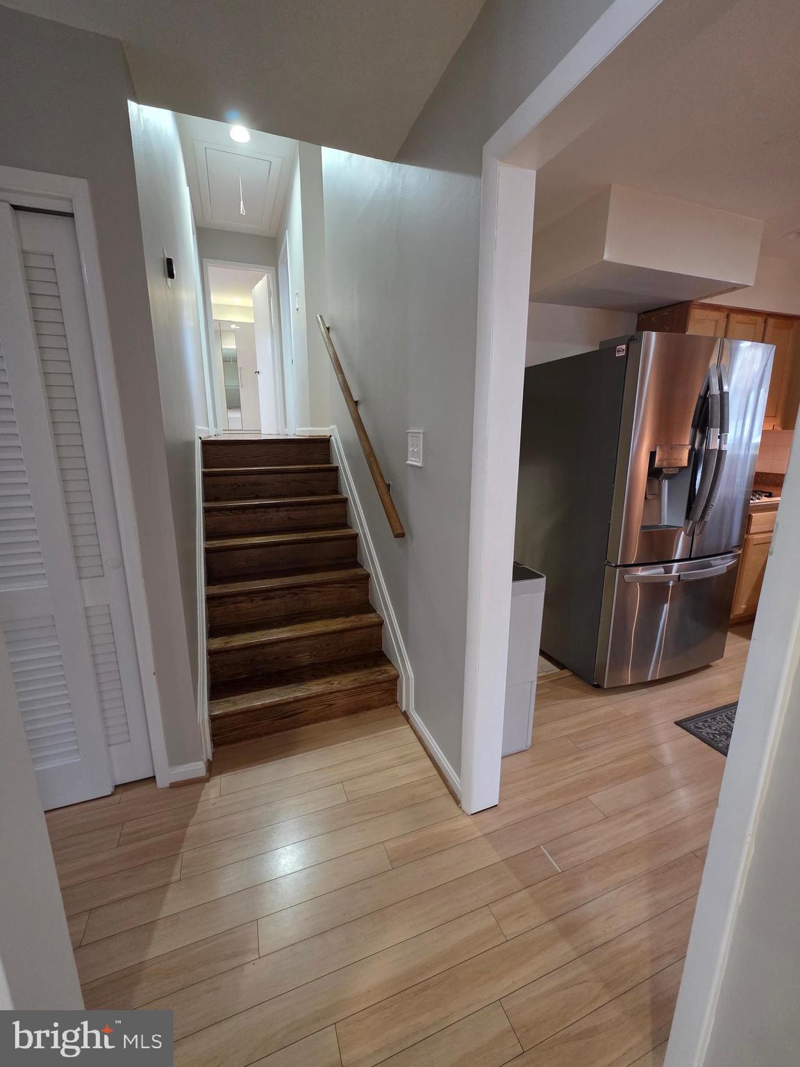 8140 Drayton Lane Springfield, VA 22151 - Photo 36 of 98 a view of entryway and hall with wooden floor