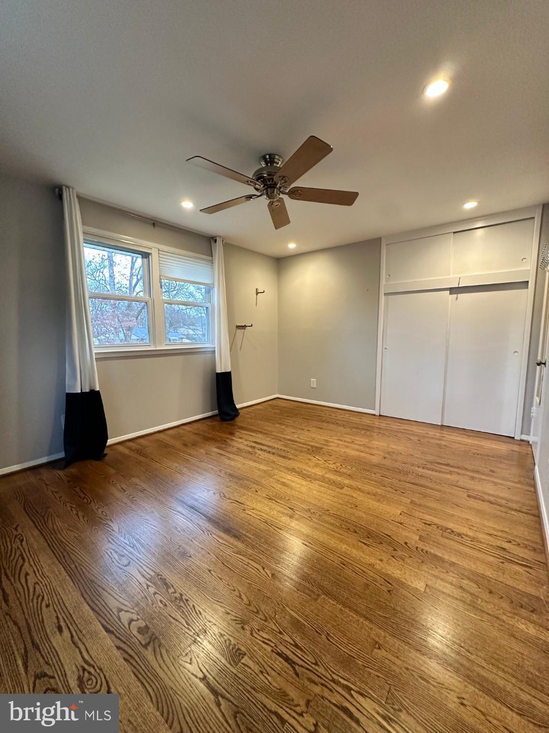 8140 Drayton Lane Springfield, VA 22151 - Photo 45 of 98 a view of empty room with window and ceiling fan