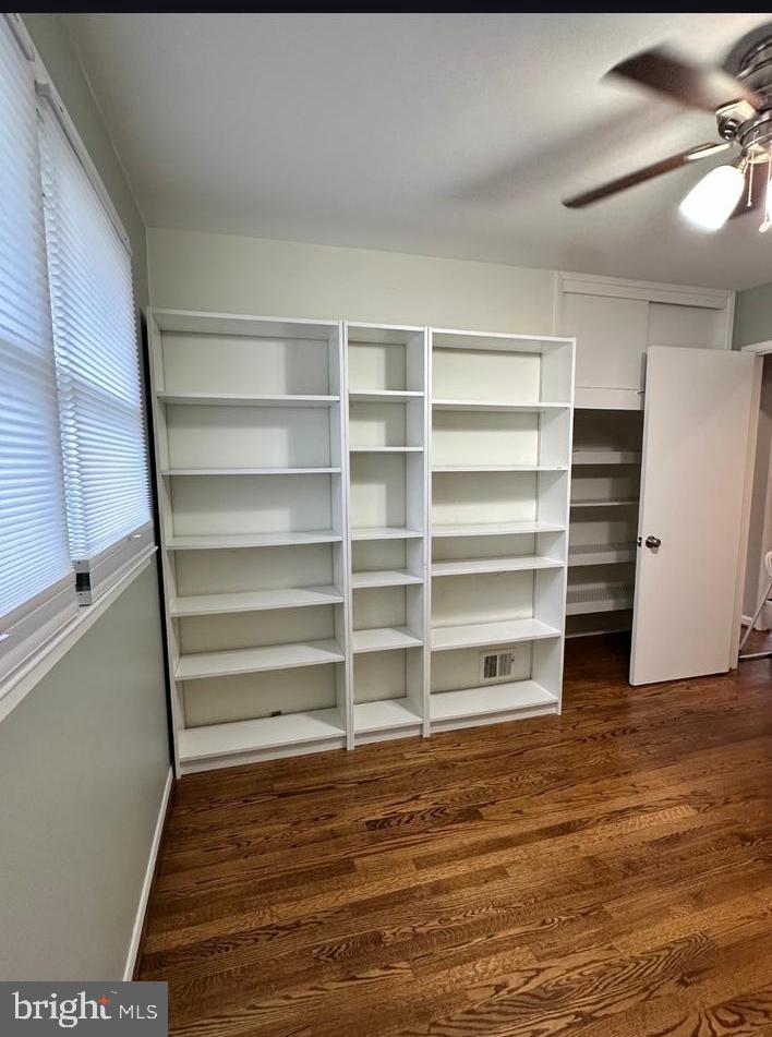 8140 Drayton Lane Springfield, VA 22151 - Photo 58 of 98 a view of walk in closet with empty racks