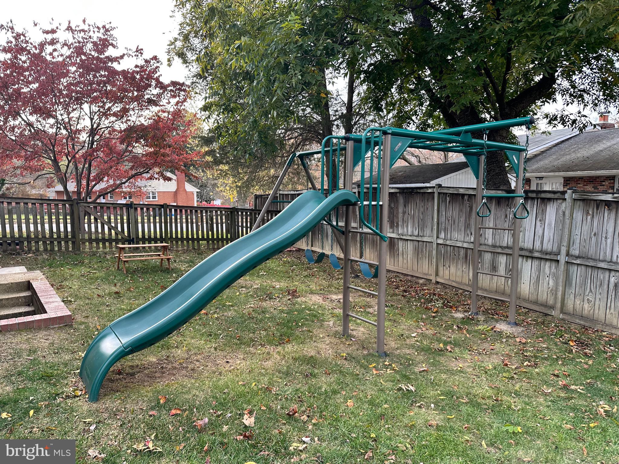 8140 Drayton Lane Springfield, VA 22151 - Photo 94 of 98 a view of a yard with a deck