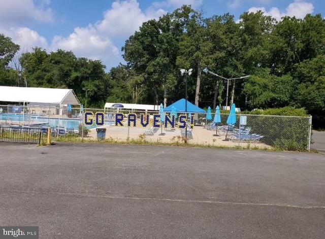 8140 Drayton Lane Springfield, VA 22151 - Photo 97 of 98 a view of backyard with swimming pool and seating space