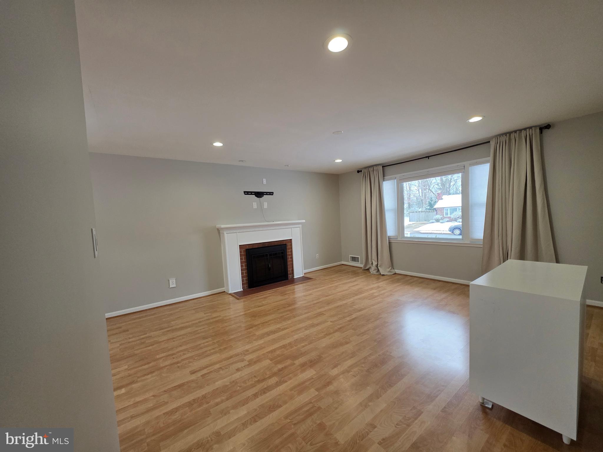 8140 Drayton Lane Springfield, VA 22151 - Photo 10 of 98 Living Room with Wood Burning Fireplace