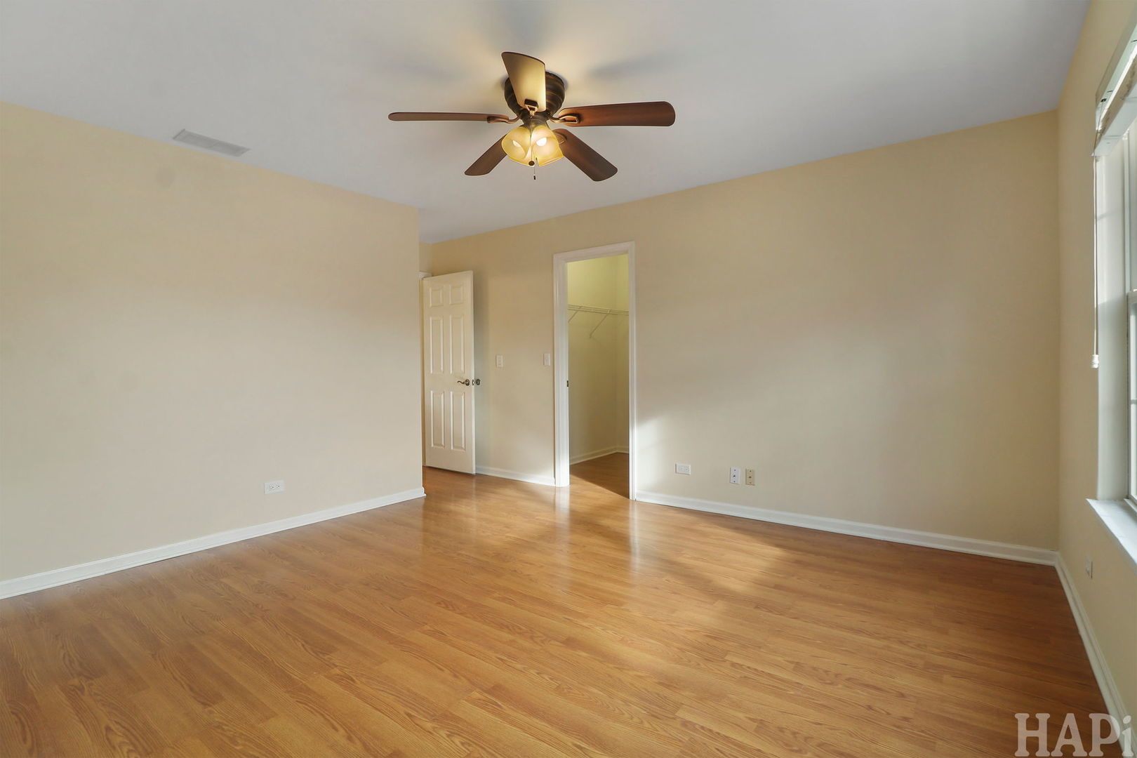 1728 Leeds Court, Unit 1728 Mundelein, IL 60060 - Photo 15 of 23 wooden floor in an empty room