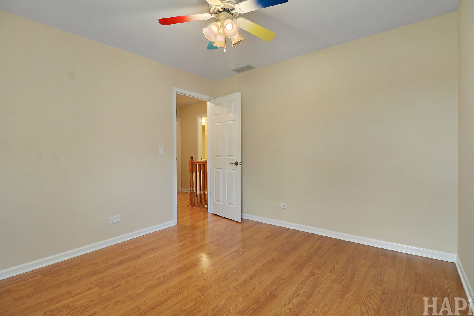 1728 Leeds Court, Unit 1728 Mundelein, IL 60060 - Photo 17 of 23 a view of an empty room with wooden floor