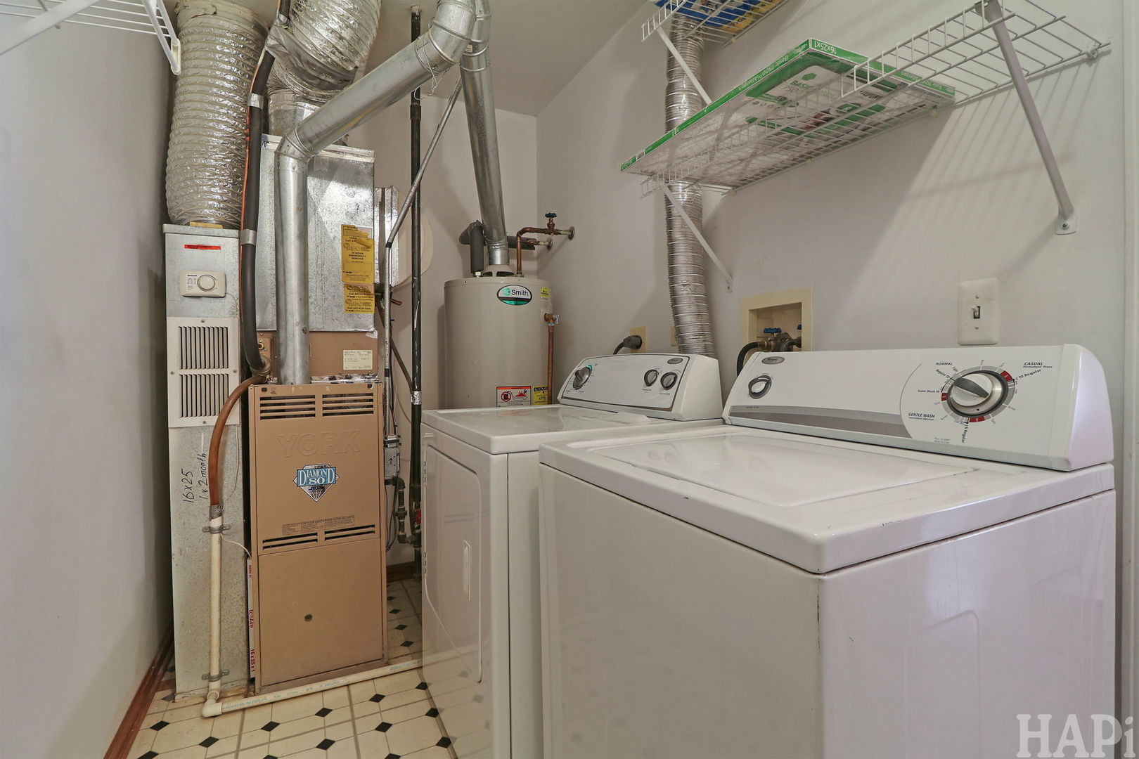 1728 Leeds Court, Unit 1728 Mundelein, IL 60060 - Photo 19 of 23 a utility room with dryer and washer