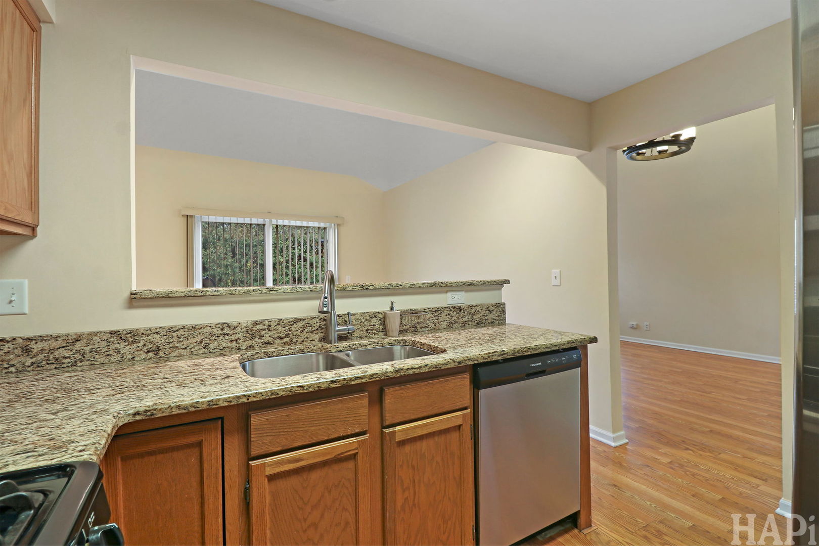 1728 Leeds Court, Unit 1728 Mundelein, IL 60060 - Photo 8 of 23 a bathroom with a granite countertop sink and a mirror