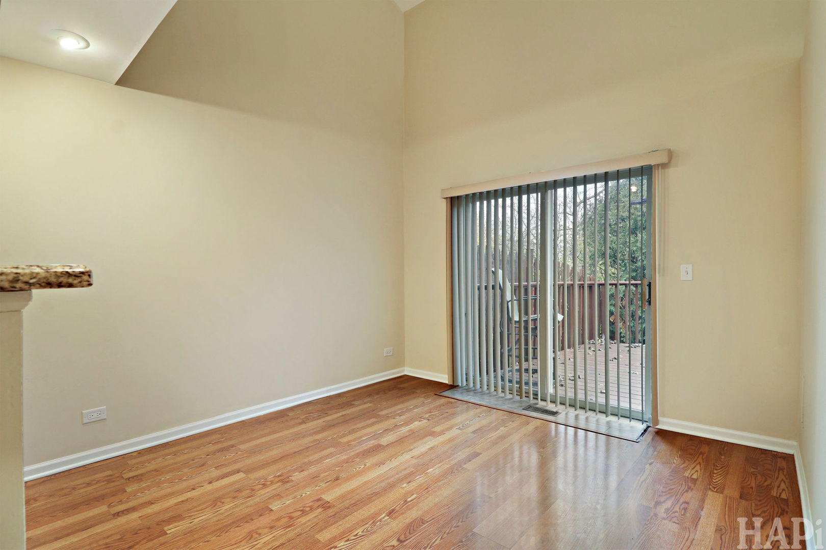 1728 Leeds Court, Unit 1728 Mundelein, IL 60060 - Photo 9 of 23 a view of a room with wooden floor