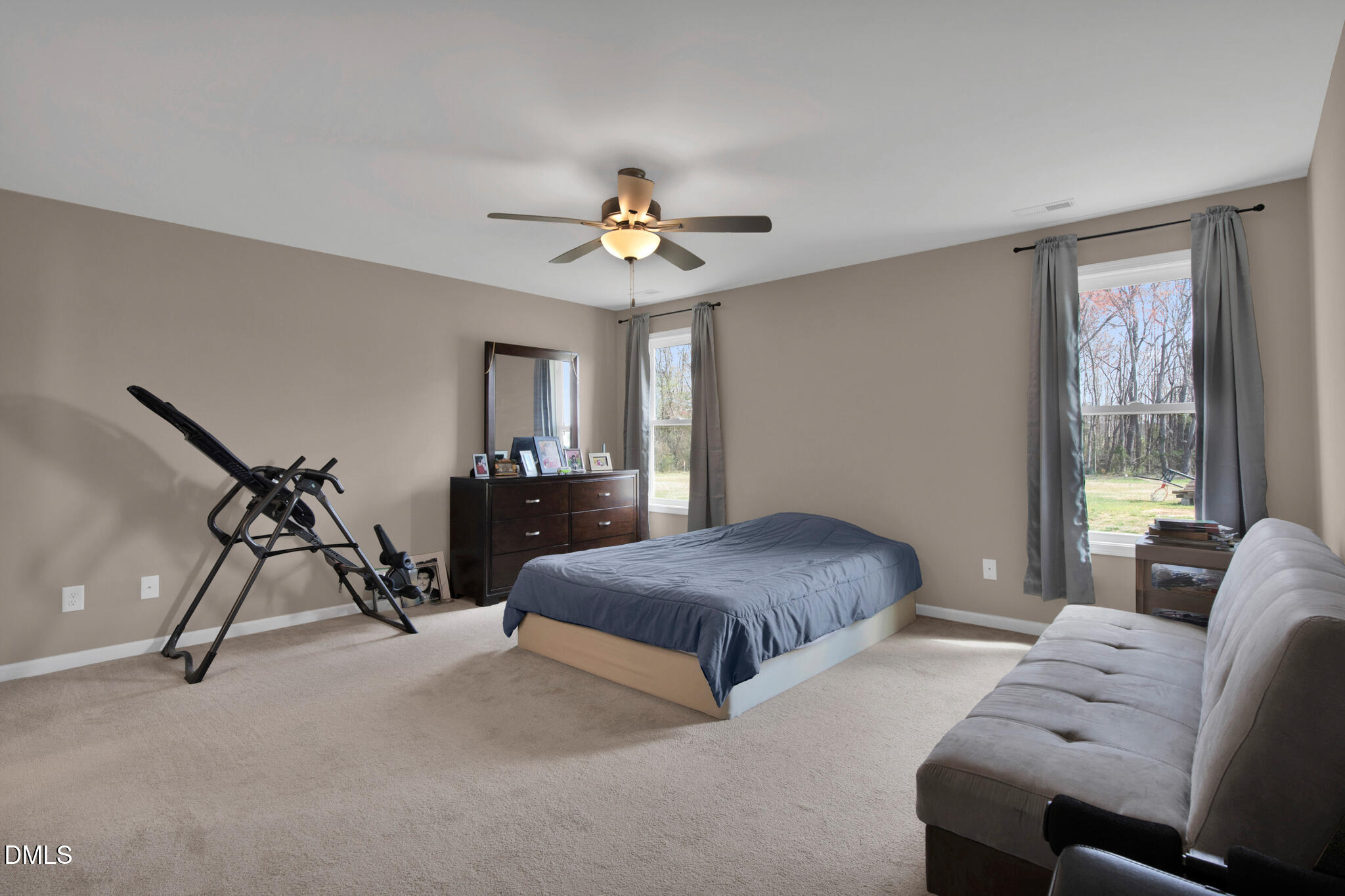 87 Hawks Croft Court Erwin, NC 28339 - Photo 16 of 30 a living room with furniture a ceiling fan and a window